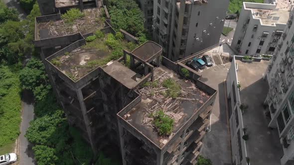 Downwards drone tilt shot revealing Macau city backdrop