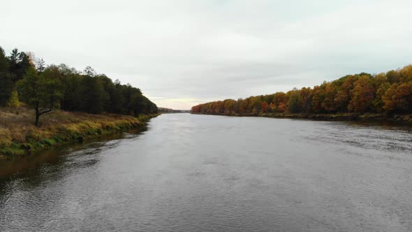 Aerial View. Flying Over the River. Beautiful Autumn Day