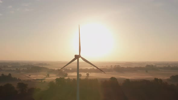 Wind Turbine Farm with Beautiful Landscape at Sunrise