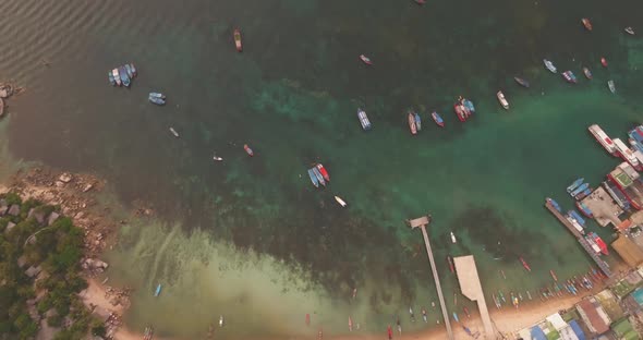 Aerial Lagoon Coast Beach Top Down Seascape View Clear Water Surface Boats Group Anchorage at Island