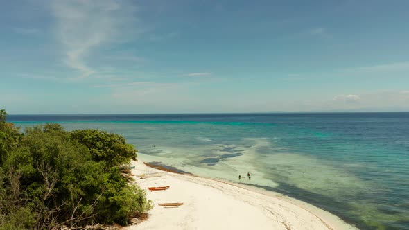 Tropical Island with Sandy Beach. Mantigue Island, Philippines