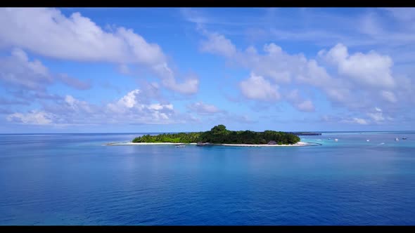 Aerial drone shot panorama of perfect tourist beach holiday by aqua blue sea and white sand backgrou
