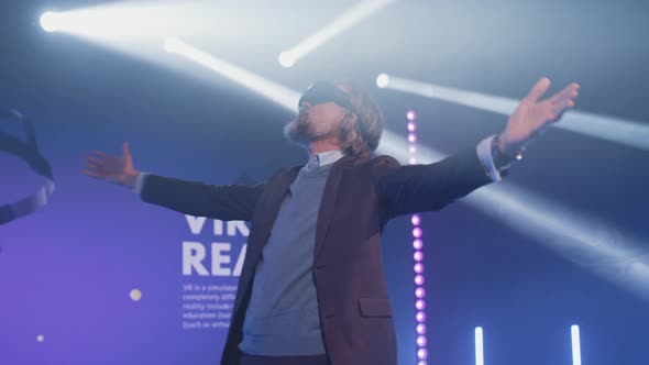 Man in Virtual Reality Gadget at Metaverse Conference