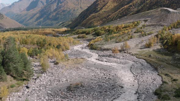 Stormy Stream of Rocky Baksan River on Mountain Valley Landscape From Flying Drone. Mountain Baksan