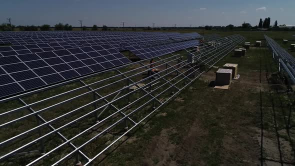 Drone is Gliding Over the Solar Panels of a Modern Solar Power Station