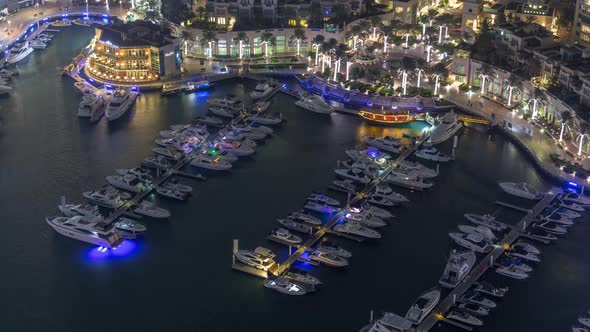 Aerial View on Yachts Floating in Dubai Marina Night Timelapse