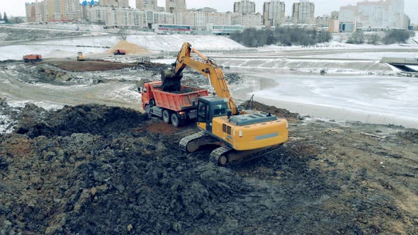 Digging Machine Is Excavating Ground at the Quarry