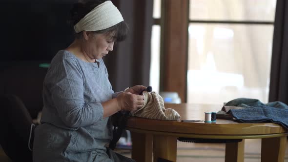 woman making a bag