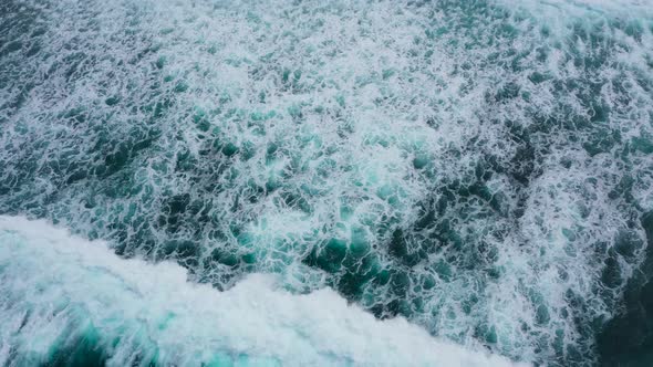 Aerial View To Ocean Waves. Blue Water Background