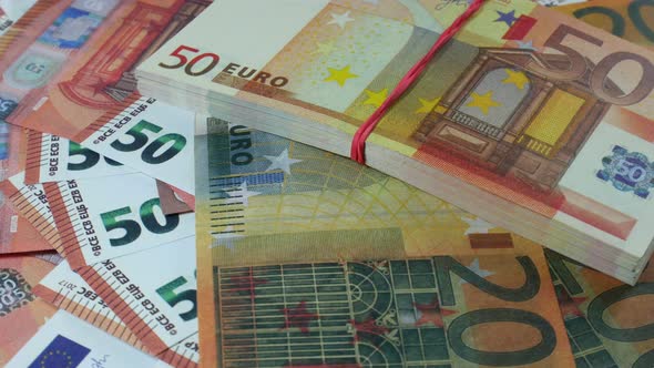 Pack Of Euro Bills On Table