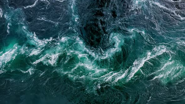 Waves of Water of the River and the Sea Meet Each Other During High Tide and Low Tide