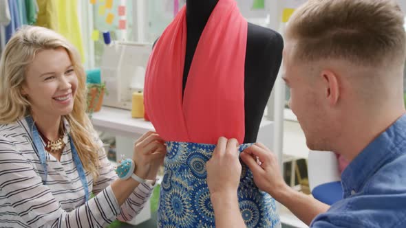 Young creatives working in a fashion studio