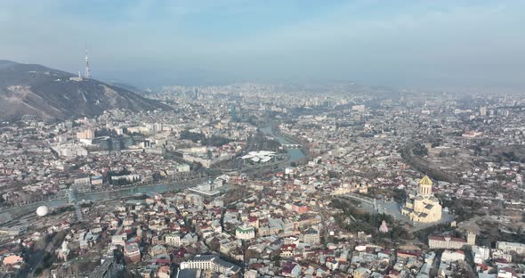 Aerial view of Holy Trinity Cathedral Sameba in Tbilisi Georgia. Sunrise drone footage.