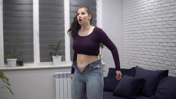 Obese Overweight Woman Pulling Up Tight Jeans Fat Waist with Small Jeans