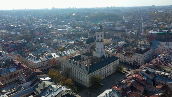 Aerial Drone Video of Lviv Old City Center - Roofs and Streets, City Hall Ratusha