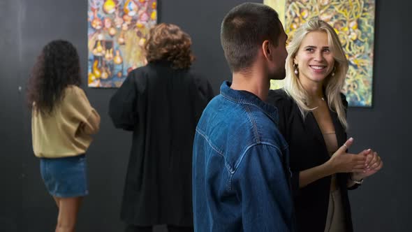 Connoisseurs of Art are Visiting Modern Art Gallery with Exhibit of Trendy Artist