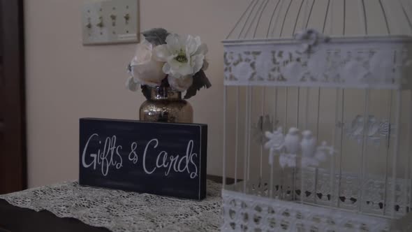 Wedding day gift table for the bride and groom, where the guests can leave cards and gifts for the c