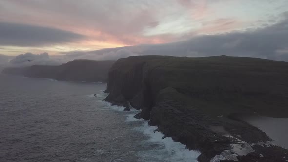 Aerial Drone Footage of Bøsdalafossur waterfall, Sørvágsvatn & Trælanípan,Vágar, Faroe Islands