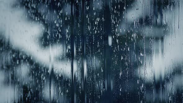 Rain Streaming Down Window Pane Dramatic