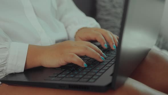 Asian Plus Size Woman Working Online with Laptop at Home Closeup Shot