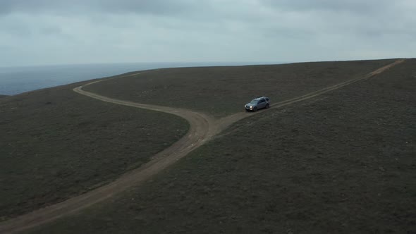 Offroad Automobile Silhouette Drives Along Ground Road