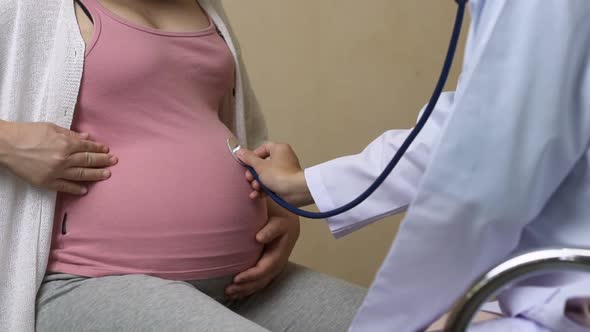 Pregnant Woman and Gynecologist Doctor at Hospital