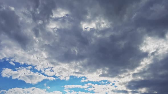 White Clouds Moving On The Blue Light Sky