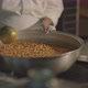 cook cooking beans in a large pot - VideoHive Item for Sale