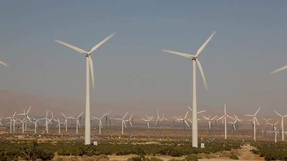 Countryside landscape of wind mils which are running together