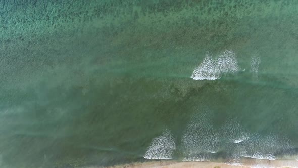Aerial view above of transparent water beach, Gili Trawangan island, Indonesia.