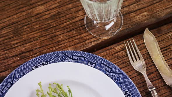 Various cutlery on wooden table 4k