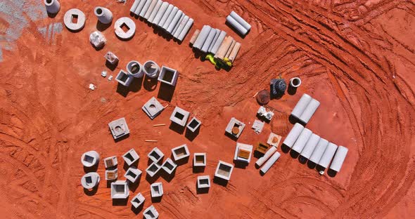 Construction Site Aerial Views of Concrete Drainage Pipe and Manhole