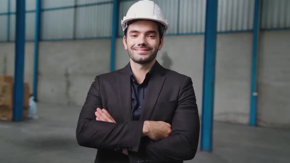 Portrait Confident Factory Manager Wearing Suit and Safety Helmet