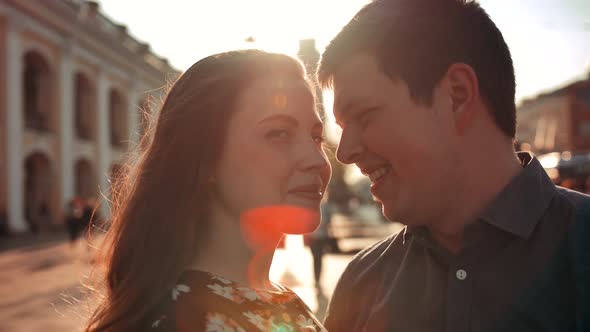 Happy Young Couple on City Street.