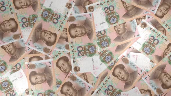 20 Chinese Yuan bills background. Many banknotes.