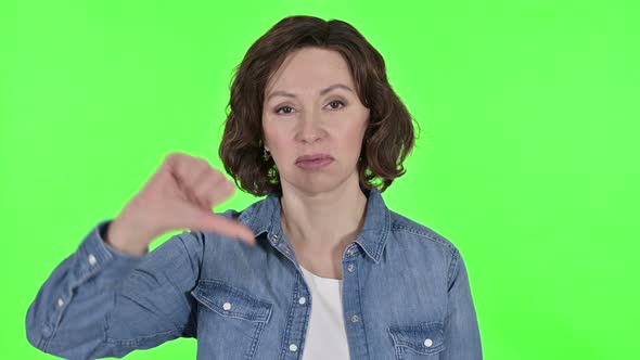 Thumbs Down By Old Woman, Green Chroma Key Background 