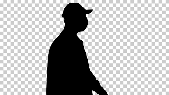 Silhouette farmer in a cap walks along, Alpha Channel