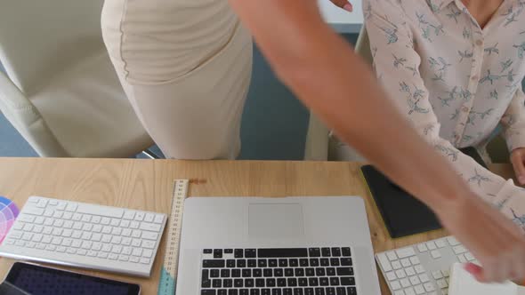 Young women working in a creative office