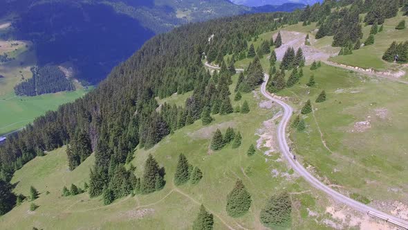 Aerial view of mountain bikers on a scenic singletrack trail