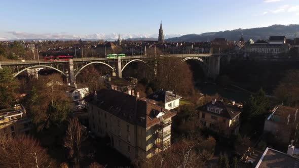 Aerial of a city with buildings and a bridge