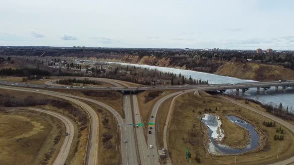 Aerial dolly along Fox Drive bridge towards North Saskatchewan River