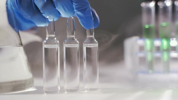 Scientist Are Putting Testtubes in Liquid Nitrogen in a Laboratory