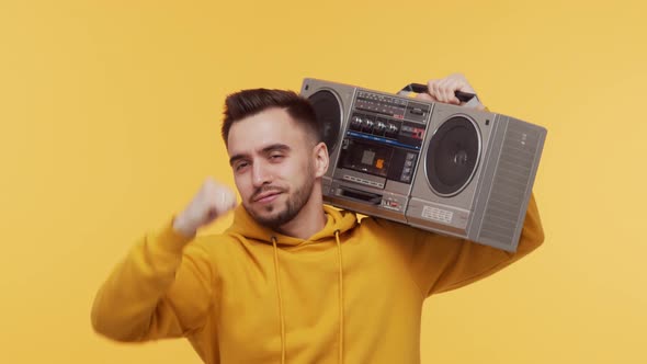 Expressive young man screaming and shouting over vibrant background.