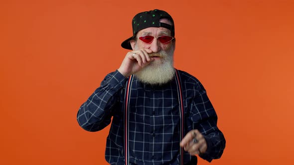 Portrait of Seductive Senior Elderly Old Bearded Grayhaired Man Wearing Sunglasses Charming Smile
