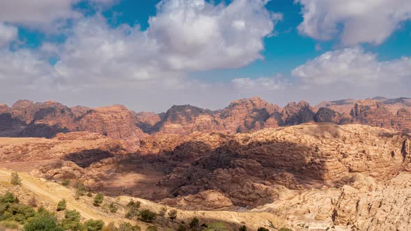 Timelapse Clouds Over Rocky Sandstone Mountains Landscape in Jordan Desert Near Petra Ancient Town