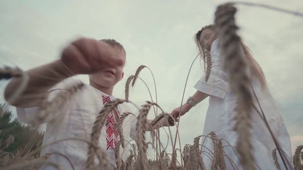 Young Cute Mother and Son in Wheat Field Countryside Nature Woman Enjoy Walks with Her Little Boy