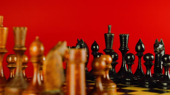 Close Up of Black Chess Pieces on Board