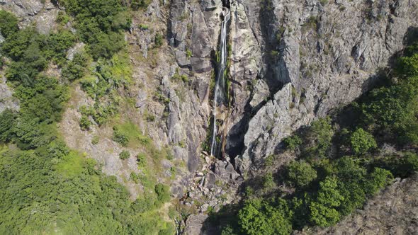 Top down view reveal, Portuguese Scenic Waterfall, Frecha da Mizarela - Arouca