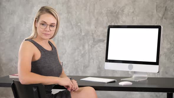 Smart Professional Woman Near Computer. White Display