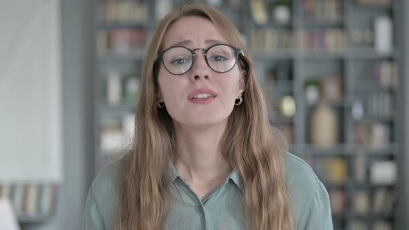 Portrait of Disappointed Woman Getting Upset in Office